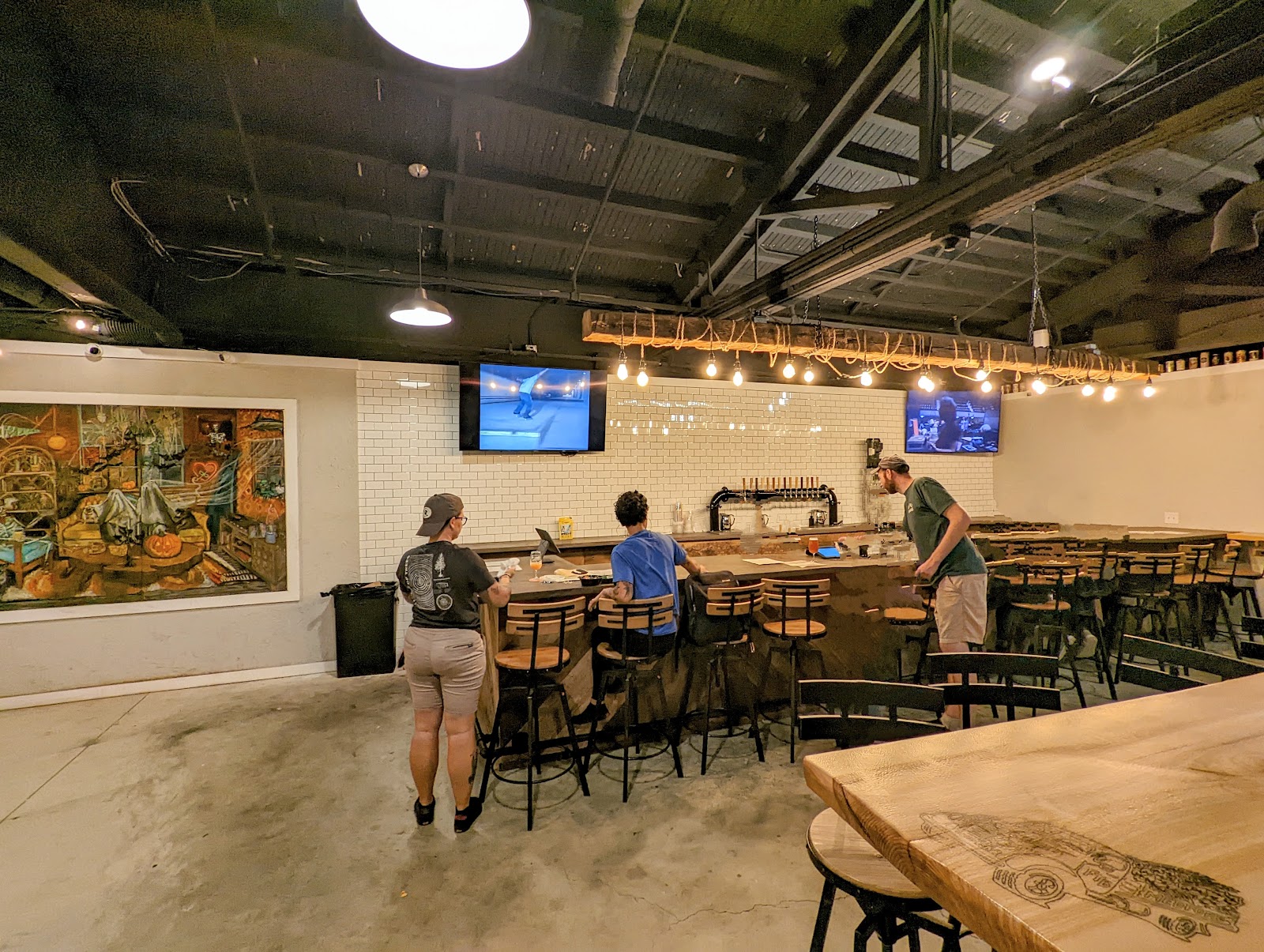 Beer taps lined up on a bar