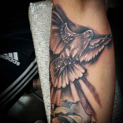 Explore rain tattoo ideas, creative tattoo ideas in Garden Grove, available at Dr. Tattoo Studio