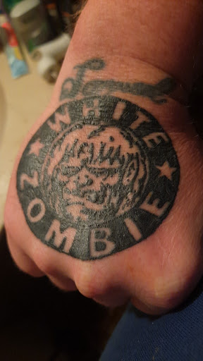 Find cat tattoo ideas simple for your next unique tattoo in Princeton at Custom Dreams Tattooing and Body Piercing