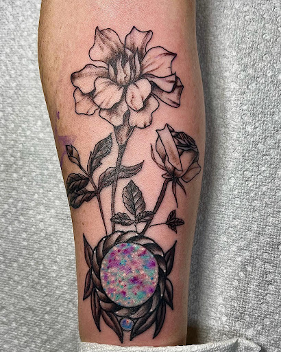 Explore front thigh tattoo ideas for women, creative tattoo ideas in Fort Oglethorpe, available at The Helm Tattoo & Piercing