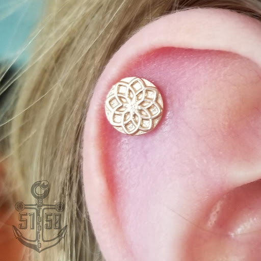 Explore pearl jam tattoo ideas, creative tattoo ideas in Kearney, available at Studio 5150 Piercing & Fine Jewelry