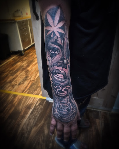 Explore hunting sleeve tattoo ideas, creative tattoo ideas in Sheridan, available at BlackbearInk Studio LLC