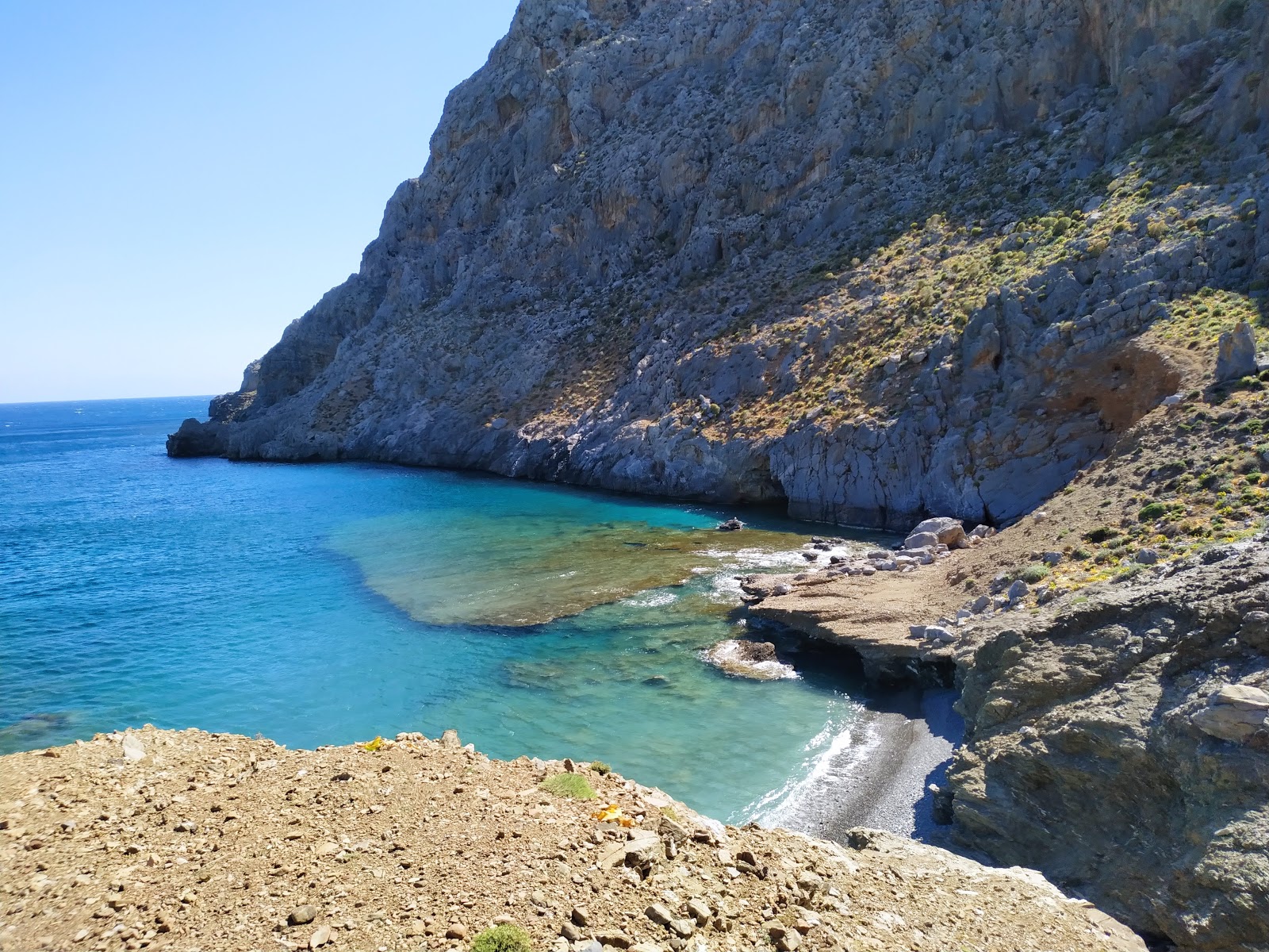 Foto von Vyzaroplaka beach mit graue kiesel Oberfläche