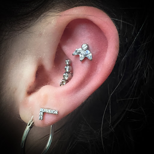 Explore jupiter tattoo ideas, creative tattoo ideas in Bay Shore, available at Piercings By Dean 95