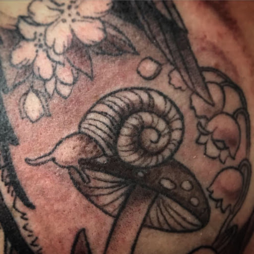 Explore 2001 tattoo ideas, creative tattoo ideas in Tecumseh, available at Lucid Tattoo Gallery