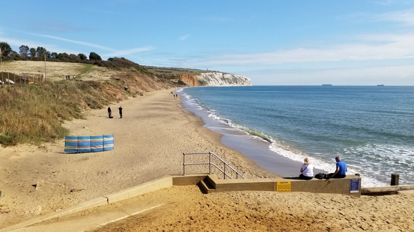 Foto de Yaverland Beach com areia bege superfície