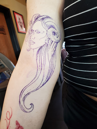 Explore band tattoo ideas, creative tattoo ideas in Albuquerque, available at Iron Anchor Tattoo Parlour