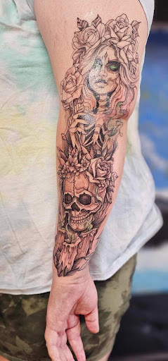 Explore stomach tattoo ideas, creative tattoo ideas in Fort Wayne, available at drieM World Tattoos & Art Gallery