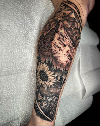 Explore son name tattoo ideas for dad, creative tattoo ideas in Lakeview, available at Backwoods Tattoo Studio