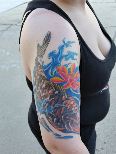 Explore pacemaker tattoo ideas, creative tattoo ideas in Green Bay, available at Darkside Tattoo By Jesse Skywalker