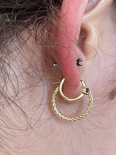 Explore hand and wrist tattoo ideas, creative tattoo ideas in Chapel Hill, available at Golden Falcon Tattoo and Piercing