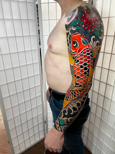 Explore snake tattoo ideas, creative tattoo ideas in Knoxville, available at Riverside Tattoo Co.