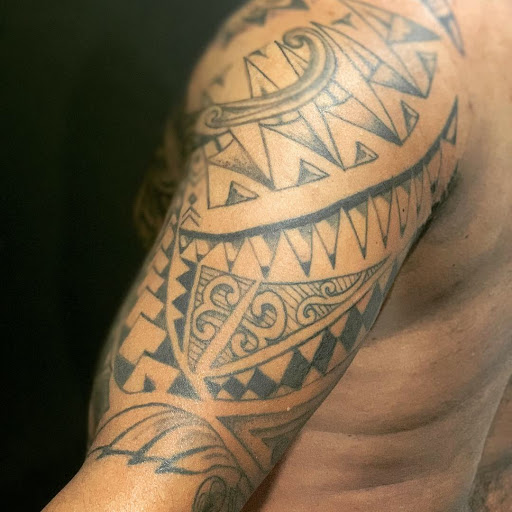 Explore mexican hand tattoo ideas, creative tattoo ideas in Scarsdale, available at Damm Nice Tattoo & Body Art