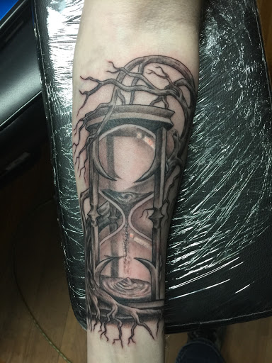 Explore cover up tattoo ideas female leg, creative tattoo ideas in Elk River, available at Subjective Art Tattoo, LLC