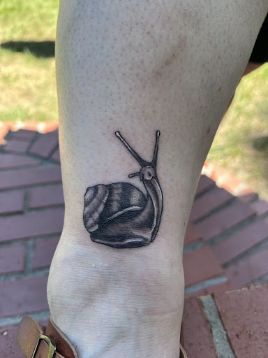 Explore totoro tattoo ideas, creative tattoo ideas in Holly Ridge, available at Evolution Tattoo Studio