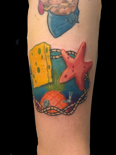 Explore tree tattoo ideas, creative tattoo ideas in Addison, available at Cat Tattoo