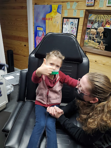 Explore dragon tattoo ideas for females, creative tattoo ideas in Louisburg, available at Purple Dot Piercings