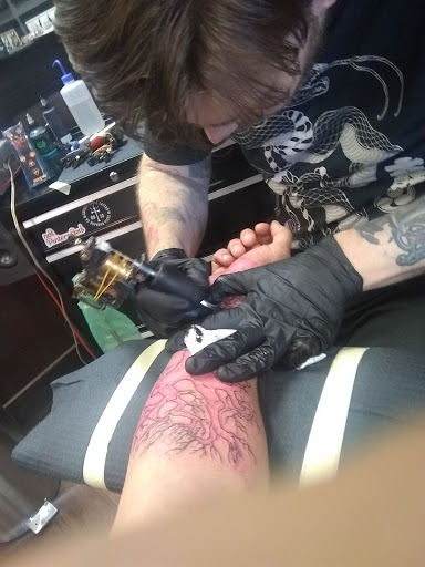 Explore easy flower tattoo ideas, creative tattoo ideas in Redding, available at Iron Mountain Tattoo