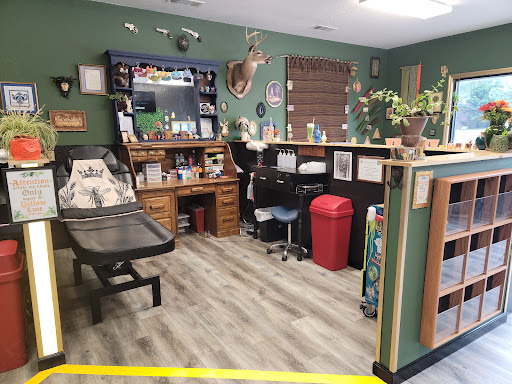 Explore small lion tattoo ideas, creative tattoo ideas in Hayesville, available at The Upper Room Tat2 Parlor