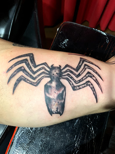 Explore guy back tattoo ideas, creative tattoo ideas in Phoenix, available at The Snooty Fox Tattoo and piercing