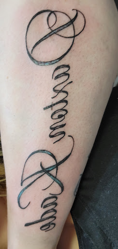 Explore behind ear tattoo ideas for guys, creative tattoo ideas in Newport, available at Ink Envy Tattoo Studio