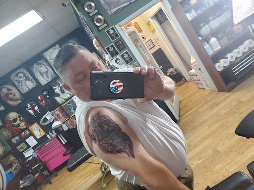 Explore swiss tattoo ideas, creative tattoo ideas in El Paso, available at House of Pain Tattoo & Body Piercing Studios