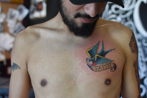 Explore thyroid tattoo ideas, creative tattoo ideas in Sanford, available at Hudson & Company Tattoo Studio