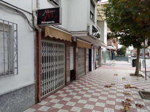 Información y opiniones sobre Peluquería Mauri de Albolote