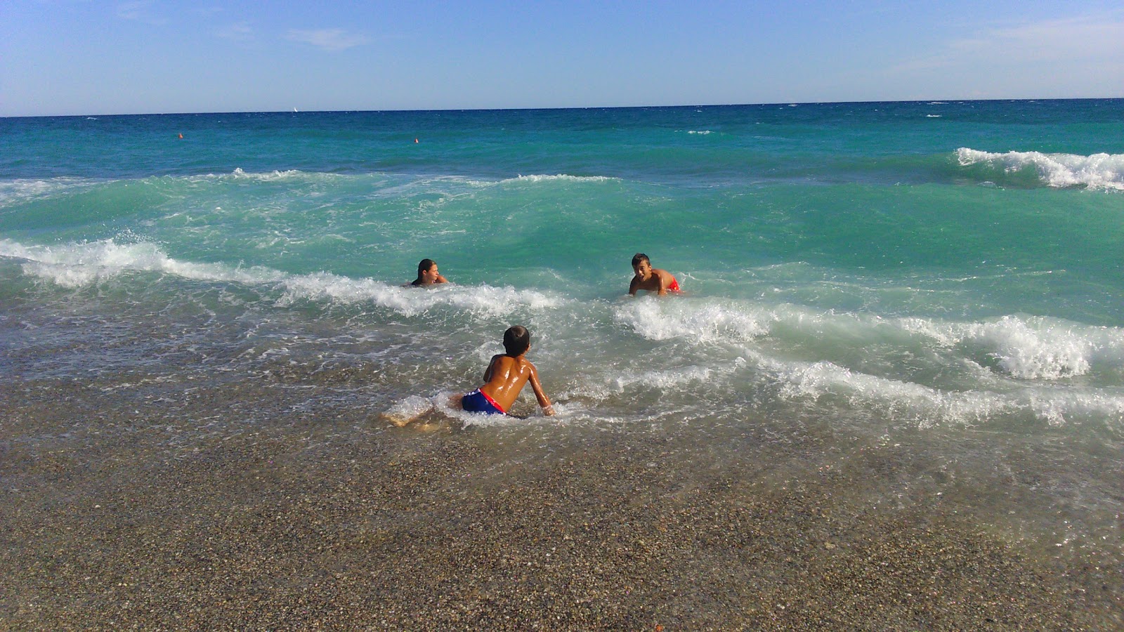 Photo de Borgio Beach - bon endroit convivial pour les animaux de compagnie pour les vacances