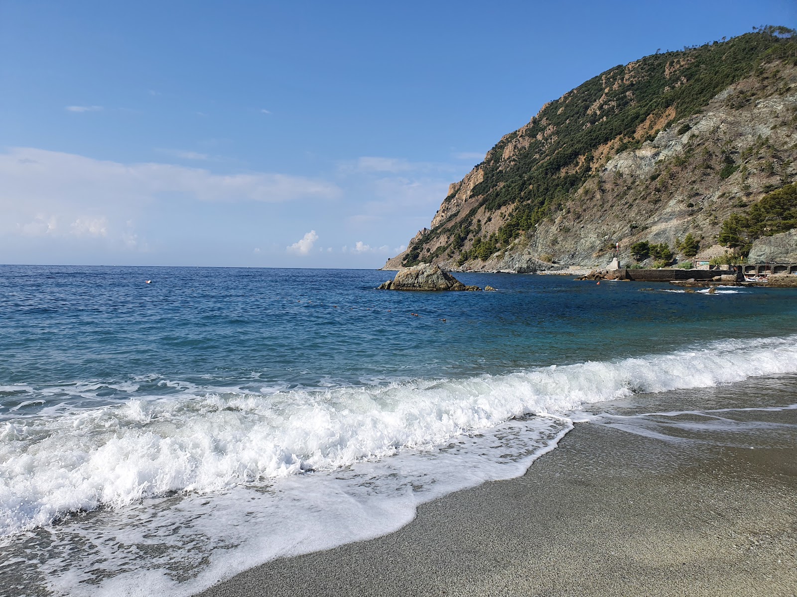 Foto von Spiaggia del Gigante mit blaues wasser Oberfläche
