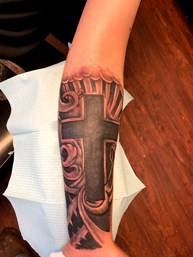 Explore side leg tattoo ideas, creative tattoo ideas in Seymour, available at American Gypsy Tattoo Corp.