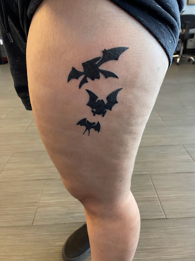 Explore sunset tattoo ideas, creative tattoo ideas in Palm Harbor, available at Angry Owl Tattoo and Piercing