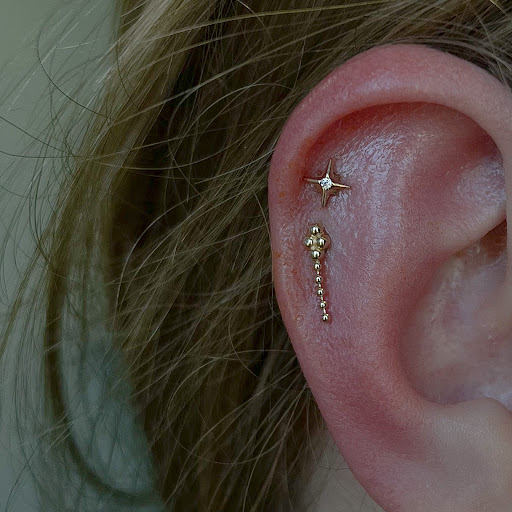 Explore small chucky tattoo ideas, creative tattoo ideas in Boston, available at Arcadia Body Piercing