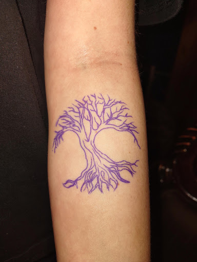 Explore behind the ear tattoo ideas for guys, creative tattoo ideas in Medina, available at Madhouse ink tattoo