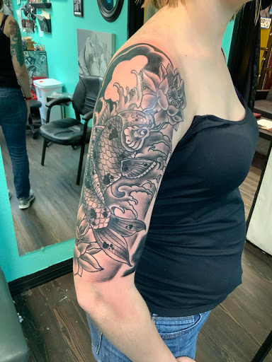 Explore tattoo 3/4 sleeve ideas, creative tattoo ideas in Mckinney, available at Borrowed Time Fine Art Gallery Tattoo Shop