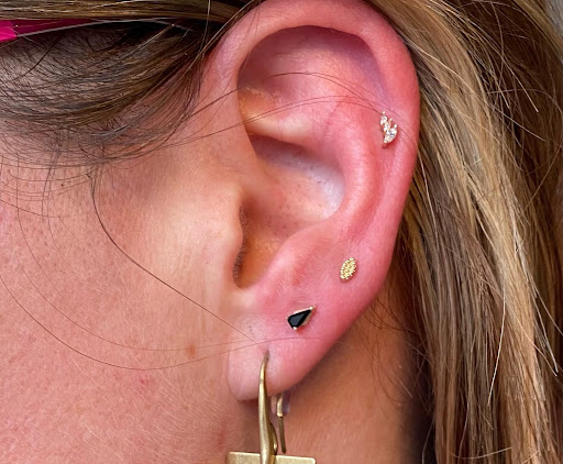 Explore swiss tattoo ideas, creative tattoo ideas in Saint Paul, available at Electric Strawberry Piercing