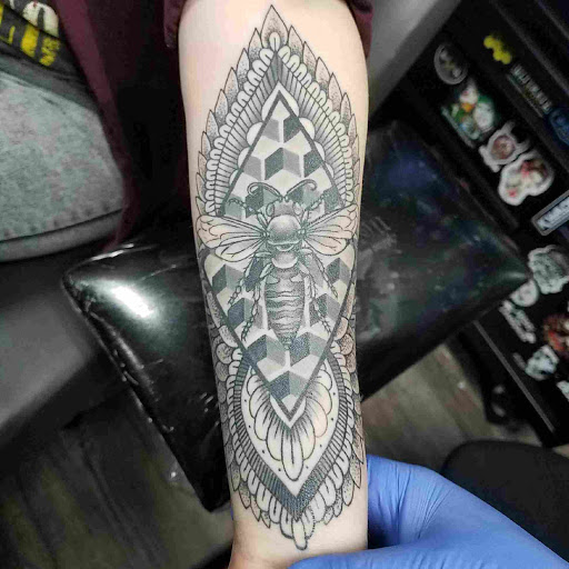 Explore bible tattoo ideas, creative tattoo ideas in Atlanta, available at Black Cloud Tattoo and Piercing