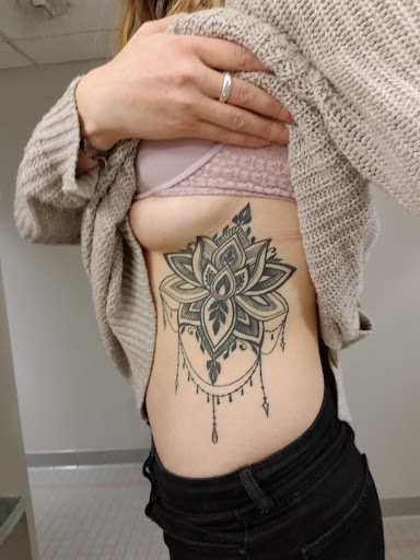 Explore tribal wolf tattoo ideas, creative tattoo ideas in Seattle, available at Slave to the Needle Tattoo & Body Piercing