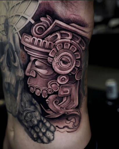 Explore belly button tattoos ideas, creative tattoo ideas in Stockton, available at Tall Tales Tattoo