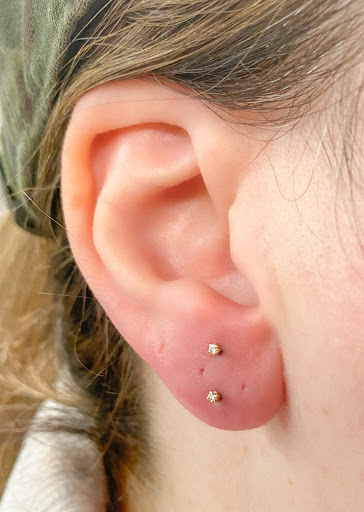 Explore mens collar bone tattoo ideas, creative tattoo ideas in Springfield, available at Body Piercing By Qui Qui