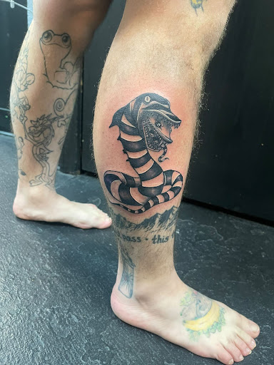 Explore lion tattoo ideas for females, creative tattoo ideas in Denver, available at Disruptive Ink Tattoos