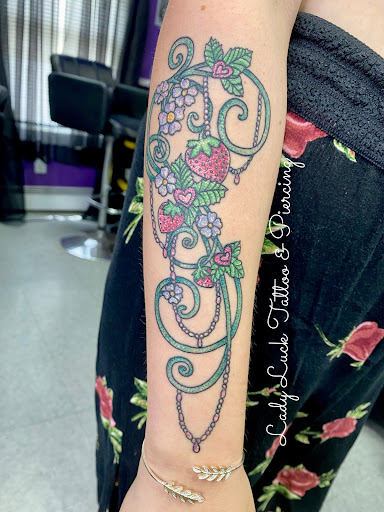 Explore purple flower tattoo ideas, creative tattoo ideas in Goshen, available at Lady Luck Studio