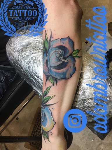 Explore kayak tattoo ideas, creative tattoo ideas in Stuart, available at Urban Inkers Tattoos