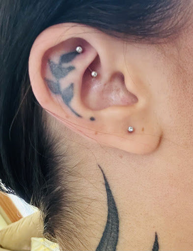 Explore world travel tattoo ideas, creative tattoo ideas in Farmington, available at Zion Tattooing & Piercing