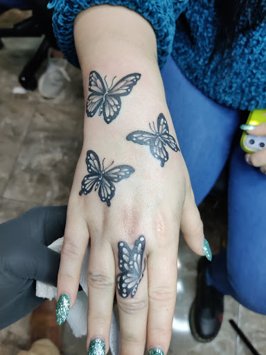 Explore bourbon glass tattoo idea, creative tattoo ideas in Fort Worth, available at HEAVY METAL TATTOO