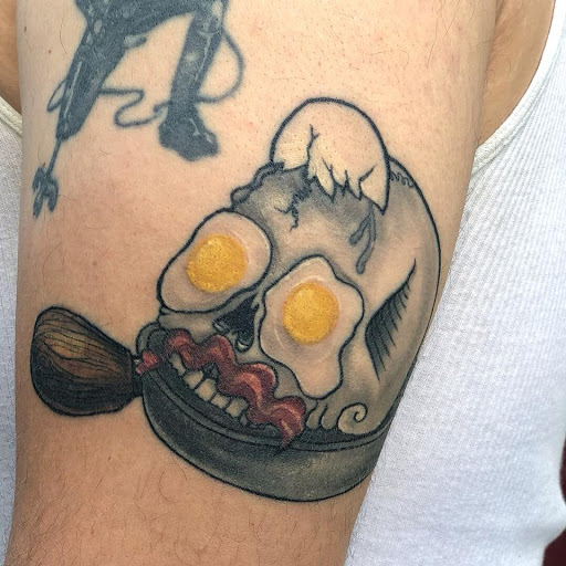 Explore unique knee tattoo ideas, creative tattoo ideas in Syracuse, available at Perfect Storm Tattoo