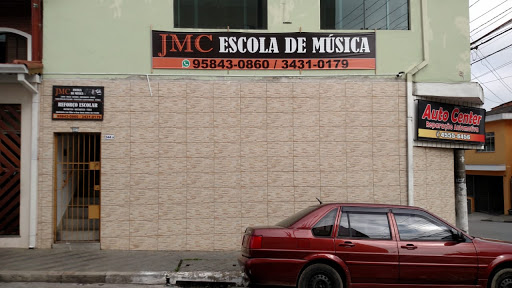 Logo da empresa - JMC Escola de Música e Matemática