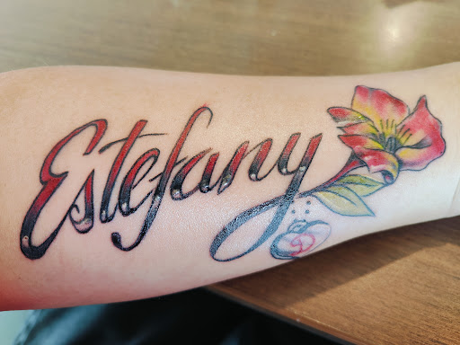 Explore lower arm tattoos ideas for guys, creative tattoo ideas in Denton, available at The Ink Well Tattoo Studio