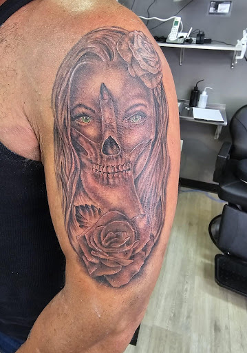 Find cervical cancer tattoos ideas for your next unique tattoo in Leesport at Kens tattoo and body piercing