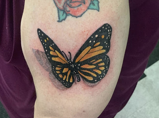 Explore roman numeral tattoo ideas for guys, creative tattoo ideas in Hudson Falls, available at ALTERED ADDICTION TATTOOS